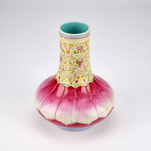 950 - A CHINESE FAMILLE ROSE 'LOTUS' BOTTLE VASE the lower body brightly enamelled with a double row of up... 