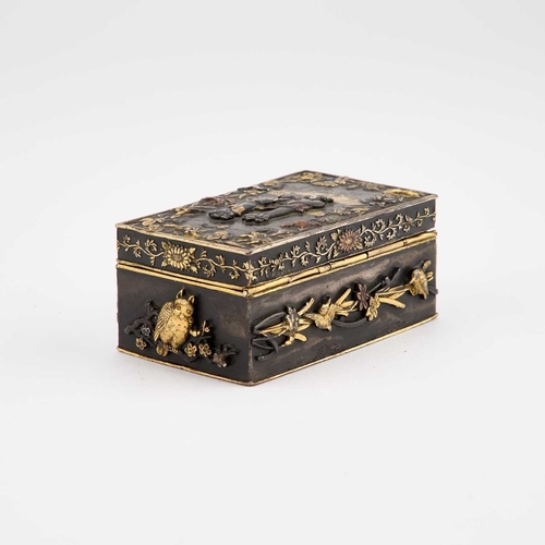 953 - A JAPANESE MIXED METAL BOX Meiji (1868-1912) era, the hinged lid decorated with figures, owls and ot... 