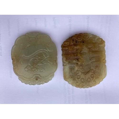 957 - TWO CHINESE JADE PENDANTS (2) Each 5.4cm by 4.4cmEach in good condition without damage.... 