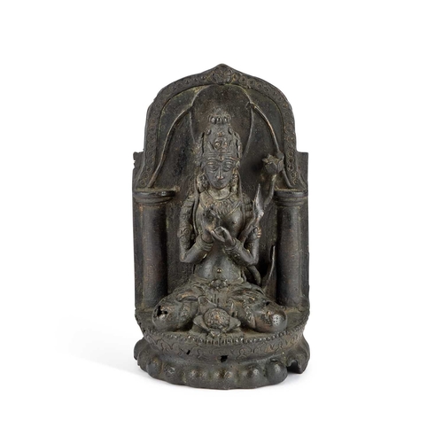 975 - A BRONZE FIGURE OF THE BUDDHIST DEITY PRAJNAPARAMITA in meditation position on a lotus base. 23.5cm ... 