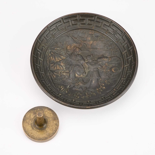 995 - A CHINESE BRONZE SEAL AND A BRONZE DISH the dish cast with figures. (2) Dish 15cm diameter