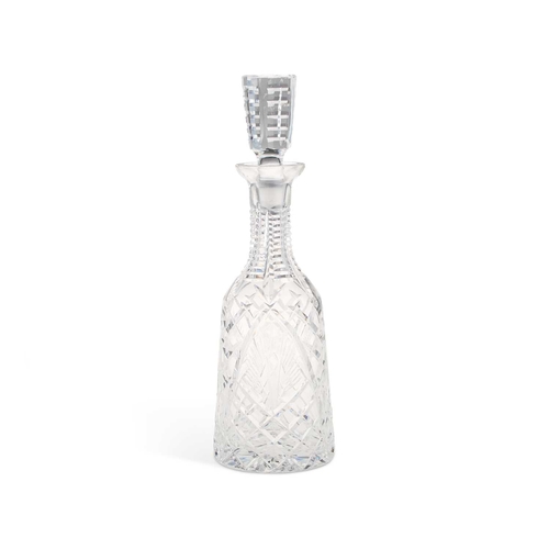 106 - A WATERFORD CUT-GLASS DECANTER AND STOPPER with an extensively cut body, neck and stopper, signed. 3... 