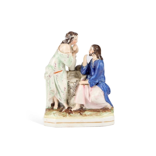 113 - A VICTORIAN STAFFORDSHIRE POTTERY FIGURE GROUP modelled as Jesus and the Samaritan Woman at the well... 