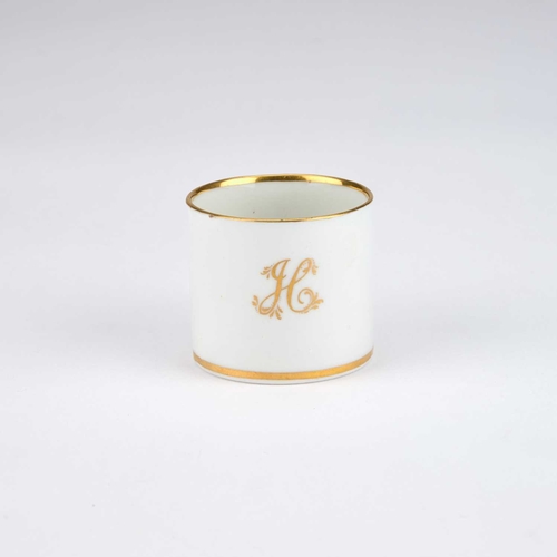 130 - A 19TH CENTURY MINIATURE MUG with the initials JC in gilt. 4.5cm high