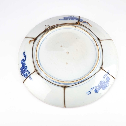 144 - A JAPANESE BLUE AND WHITE CHARGER early 20th Century. 36cm diameter