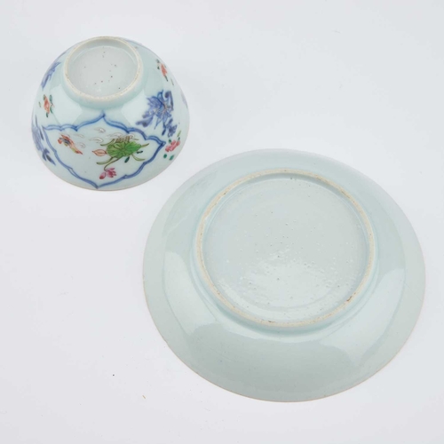 164 - V AN 18TH CENTURY CHINESE FAMILLE ROSE TEA BOWL AND SAUCER the tea bowl decorated with two reserves ... 