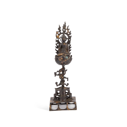 171 - A BRONZE FIGURE OF SHAKYAMUNI BUDDHA remnants of gilding. 30cm high