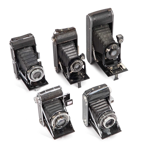 243 - A GROUP OF FOLDING CAMERAS comprising a Rheinmetall Weltax with a Carl Zeiss Jena Tessar 75mm F/3.5 ... 