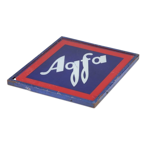 244 - AN AGFA PAINTED GLASS ADVERTISING SIGN the glass panel sitting within a painted metal frame. 48cm by... 