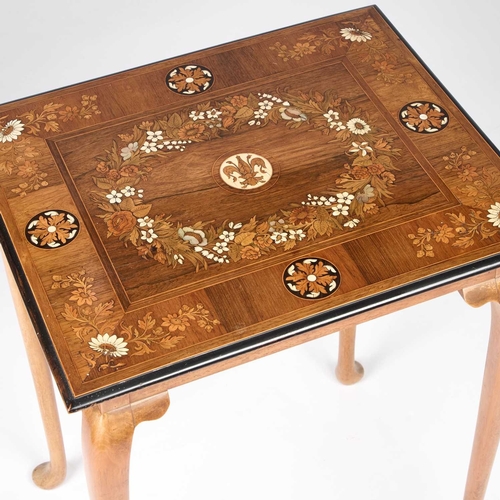 290 - § A CONTINENTAL FLORAL MARQUETRY OCCASIONAL TABLE the top 19th Century, the base later. 74.5cm high,... 