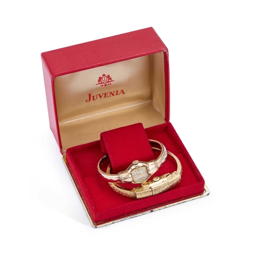 74 - A JUVENIA LADY'S BANGLE WRISTWATCH no. 654655, with box, together with a Bulova lady's bangle watch.... 