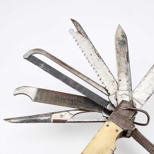 127 - § AN OVERSIZED 19TH CENTURY COACHMAN'S MULTI BLADE FOLDING POCKET KNIFE having an ivory-mounted hand... 