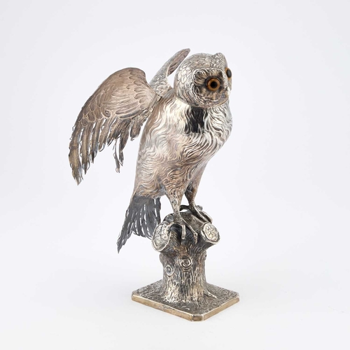 184 - A LARGE GERMAN SILVER MODEL OF AN OWL Hanau marks, late 19th Century, modelled perched on a tree stu... 