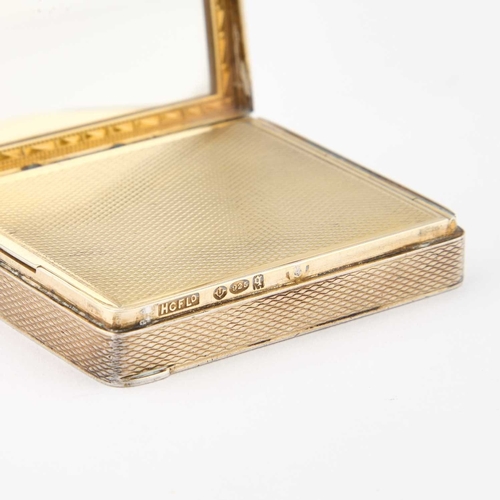 189 - AN EARLY 20TH CENTURY CONTINENTAL SILVER-GILT AND ENAMEL COMPACT import marks, H C Freeman Ltd, Lond... 