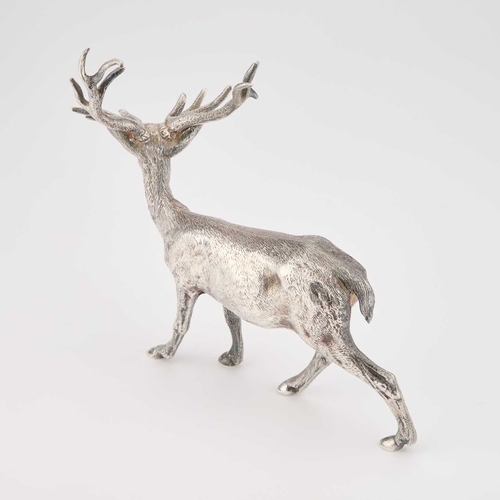 211 - AN ELIZABETH II SILVER MODEL OF A STAG by C J Vander Ltd, London 1972, realistically modelled standi... 