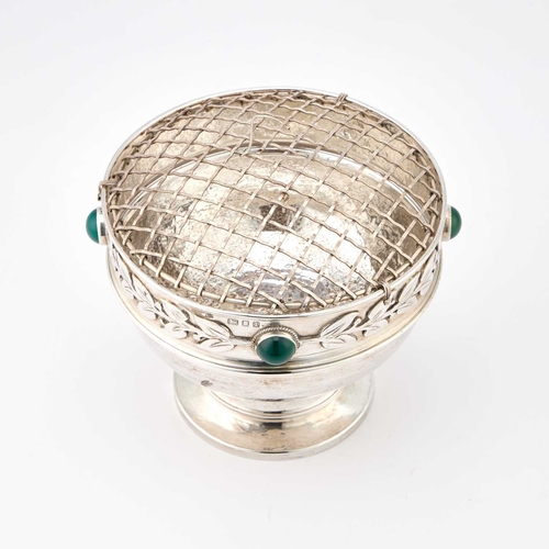 229 - AN ARTS AND CRAFTS HAMMERED SILVER ROSE BOWL by Amy Sandheim Ltd, London 1934, the border with a rai... 