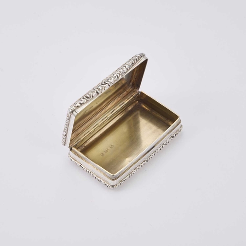 274 - A WILLIAM IV SILVER SNUFF BOX by John Tongue, Birmingham 1834, of rectangular form with chased folia... 