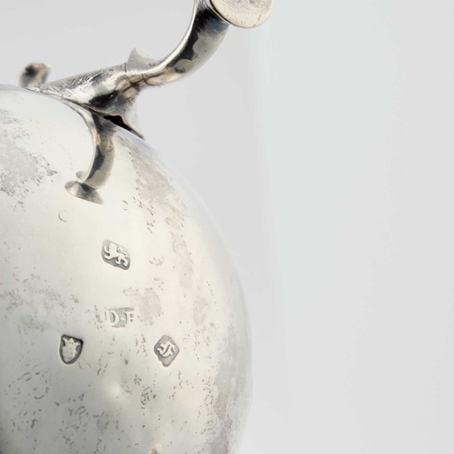 305 - AN EARLY GEORGE III SILVER CREAM JUG maker's mark indistinct, London 1761, chased with scrolls and f... 