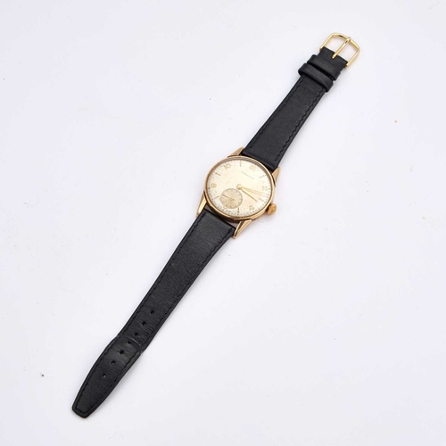 384 - A GENTS 9CT GOLD LONGINES STRAP WATCH the circular silvered dial signed Longines with alternate Arab... 