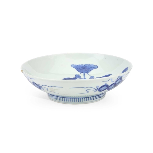 47 - A JAPANESE BLUE AND WHITE PORCELAIN FOOTED DISH circular with rounded sides, the bowl painted with f... 