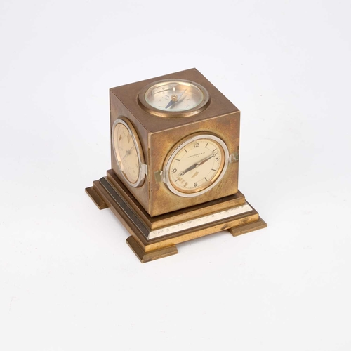 700 - A BRASS-CASED COMPENDIUM CLOCK KIRBY BEARD & CO, PARIS, FIRST HALF 20TH CENTURY a rotating cube on a... 