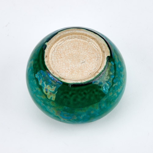 103 - A CHINESE GREEN-GLAZED BRUSH WASHER the squat body covered in a lustrous green glaze. 5.5cm highNo c... 