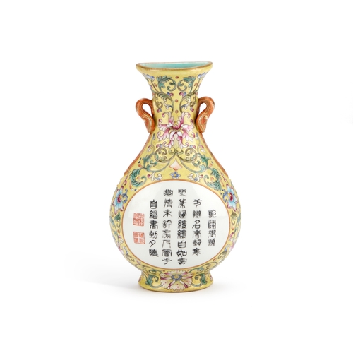 128 - A CHINESE FAMILLE ROSE WALL VASE WITH A YELLOW-GROUND of baluster form, the body finely decorated wi... 