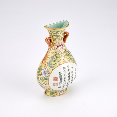 128 - A CHINESE FAMILLE ROSE WALL VASE WITH A YELLOW-GROUND of baluster form, the body finely decorated wi... 