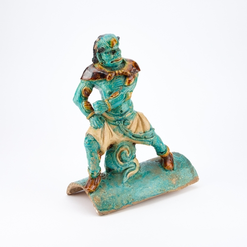 136 - A CHINESE TURQUOISE-GLAZED 'WARRIOR' ROOF TILE, MING DYNASTY 34cm high