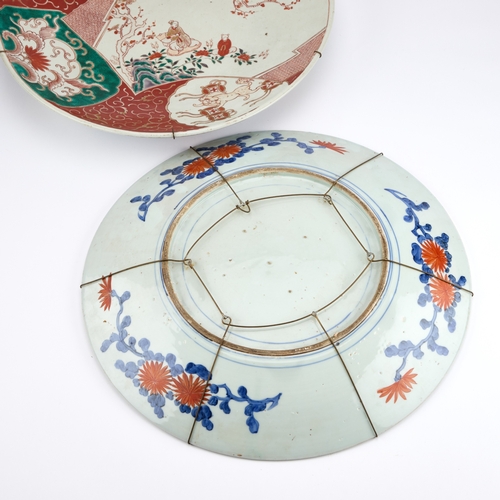 147 - A LARGE PAIR OF 19TH CENTURY JAPANESE IMARI PORCELAIN CHARGERS each circular, decorated in iron-red,... 