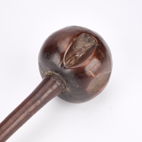 15 - A FIJI THROWING CLUB I ULA DRISIA with a coconut container shape head and a grip with carved zig-zag... 