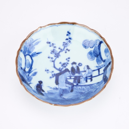 161 - A JAPANESE BLUE AND WHITE PORCELAIN CUP AND SAUCER PROBABLY 17TH CENTURY each painted with figures w... 