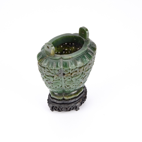 177 - A CHINESE SPINACH JADE CENSER 19TH CENTURY OR EARLIER the tapering lobed oval body with rounded side... 