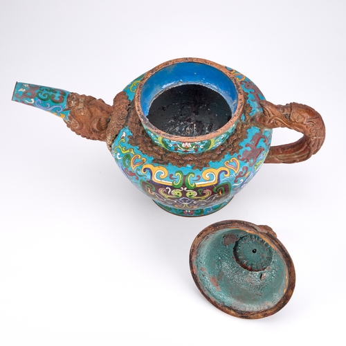 180 - A CHINESE CLOISONNÉ ENAMEL OVERSIZED TEAPOT of striking proportions, the squat, shouldered body surm... 