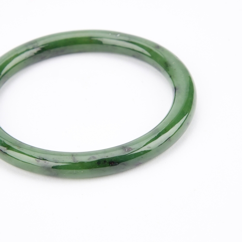 187 - A CHINESE JADE TOGGLE AND A BANGLE (2) Bangle 8.3cm diameter