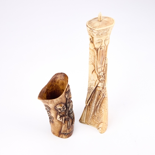 195 - TWO CHINESE BONE CARVINGS the first carved as a deity, the second as a brush pot with figures in rel... 