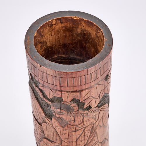 209 - A CHINESE BAMBOO BRUSH POT the tall cylindrical vessel carved with a figure. 40cm high