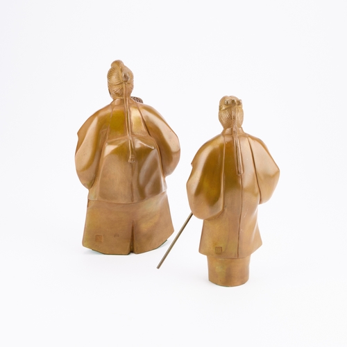 216 - TWO JAPANESE BRONZE FIGURES each modelled standing, one holding a rake, the other a broom, signed wi... 