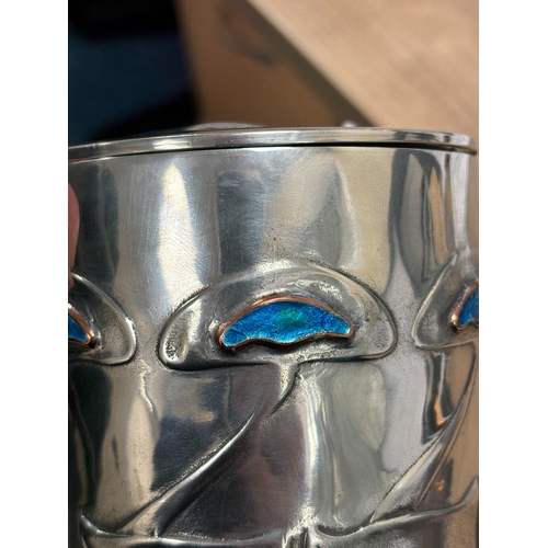 241 - ARCHIBALD KNOX (1864-1933) FOR LIBERTY & CO, A TUDRIC PEWTER AND ENAMEL BISCUIT BARREL cylindrical, ... 