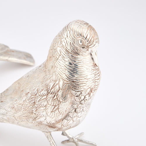 251 - A PAIR OF SILVER-PLATED MODELS OF PIGEONS each realistically cast. (2) 16cm high