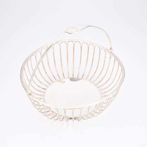 261 - A 19TH CENTURY SILVER-PLATED WIREWORK SWING-HANDLE BASKET circular with rounded sides and a reeded r... 