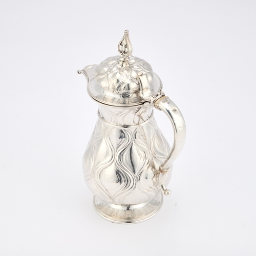 272 - § AN ARTS AND CRAFTS SILVER HOT WATER JUG by Omar Ramsden, London 1923, of baluster form with hinged... 