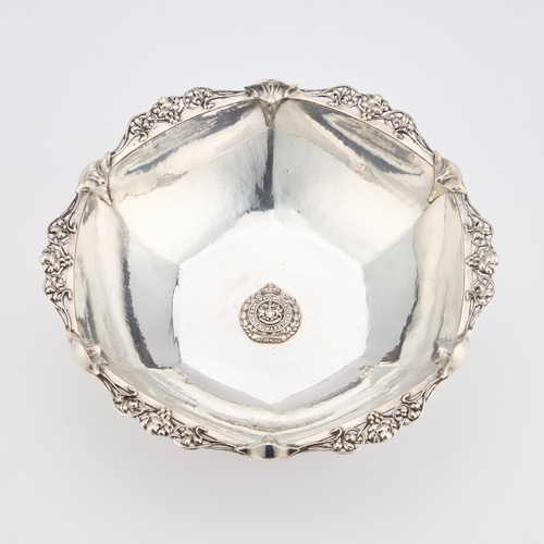 275 - AN ARTS AND CRAFTS SILVER BOWL by Omar Ramsden, London 1936, the hexagonal lightly spot-hammered bow... 