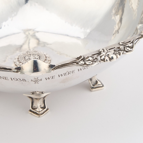 275 - AN ARTS AND CRAFTS SILVER BOWL by Omar Ramsden, London 1936, the hexagonal lightly spot-hammered bow... 