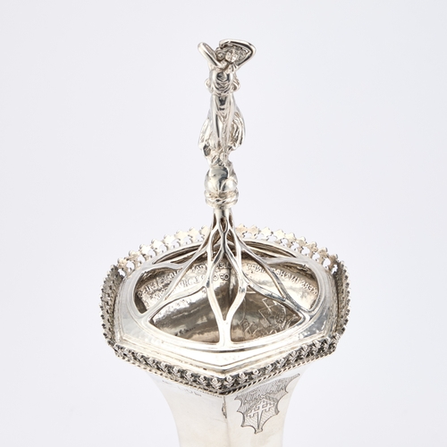 281 - AN ARTS AND CRAFTS SILVER TROPHY CUP by Omar Ramsden & Alwyn Carr, London 1913, with an open-wor... 