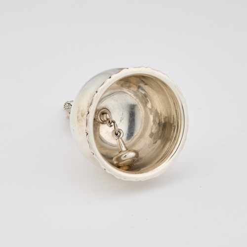 285 - AN AMERICAN STERLING SILVER TABLE BELL by Tiffany & Co, of bulbous form with a leaf-cast border,... 