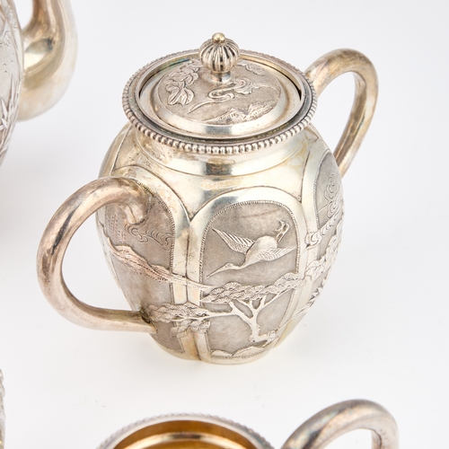 298 - § A CHINESE SILVER FOUR-PIECE TEA SERVICE mark of Kwan Wo, late 19th Century, comprising a teapot, c... 