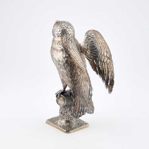 308 - A LARGE GERMAN SILVER MODEL OF AN OWL Hanau marks, late 19th Century, modelled perched on a tree stu... 