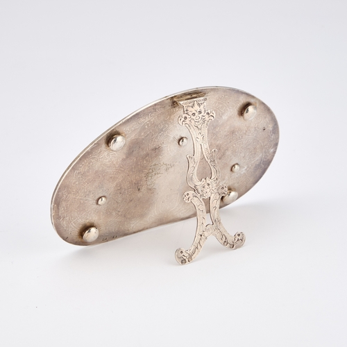 313 - A SILVER DESK CALENDAR stamped several times with a lion mark, probably 19th century, kidney-shaped,... 