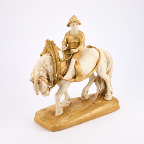 33 - A ROYAL DUX FIGURE modelled as a farmhand riding a horse, mounted on a grassy base, no. 1693, applie... 